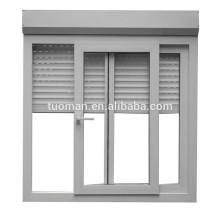 Monoblock sliding window with shutters